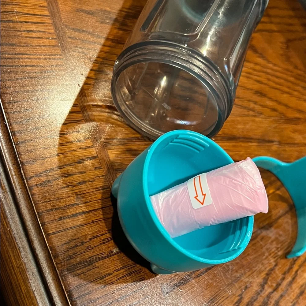 Pet Multifunctional Water Bottle with some little plastic bag inside New
